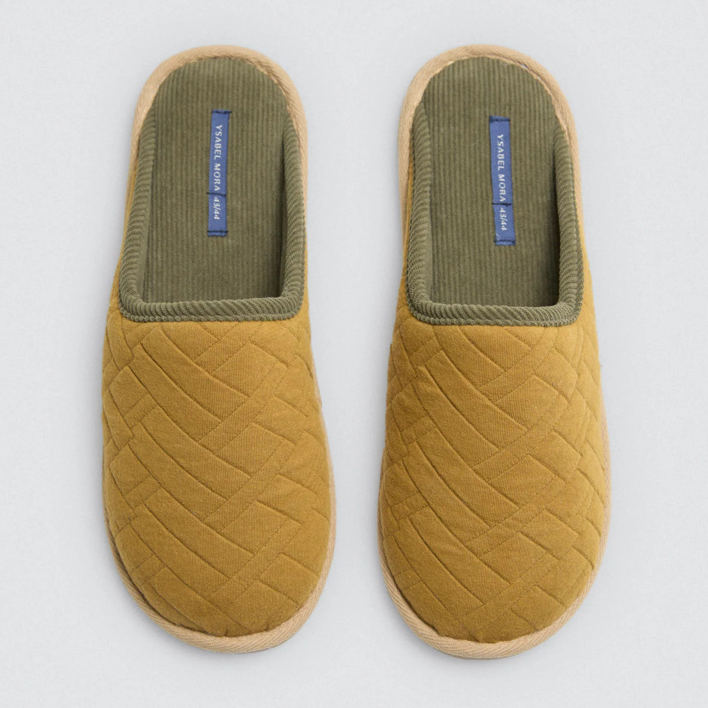 Pantofole in pelliccia con stampa etnica