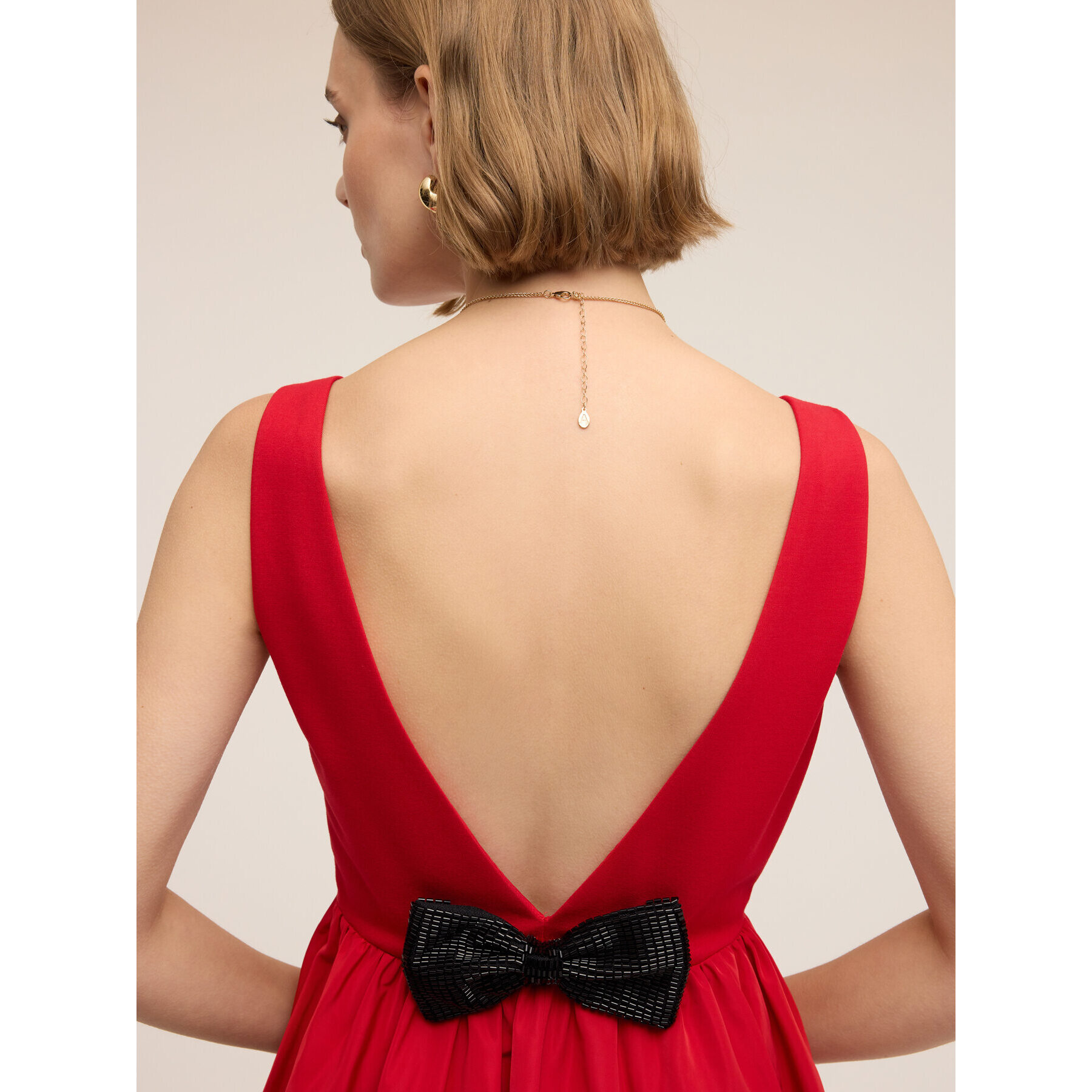 Motivi - Minidress senza maniche con fiocco - Rosso