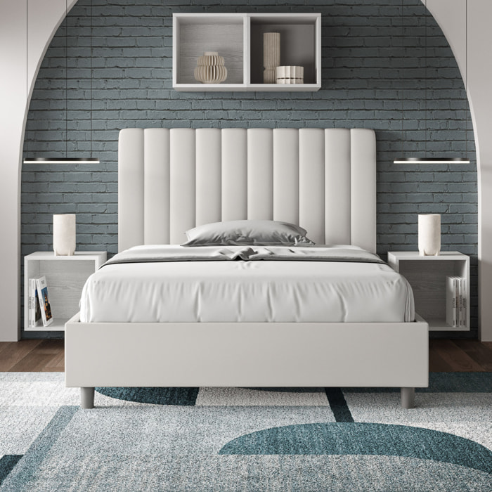 Letto una piazza e mezza contenitore imbottito 120x210 similpelle bianco Agueda