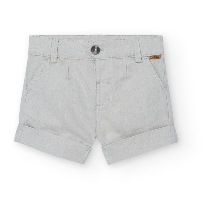Bermudas niÃ±o, lino liso, cierre botÃ³n, color beige piedra