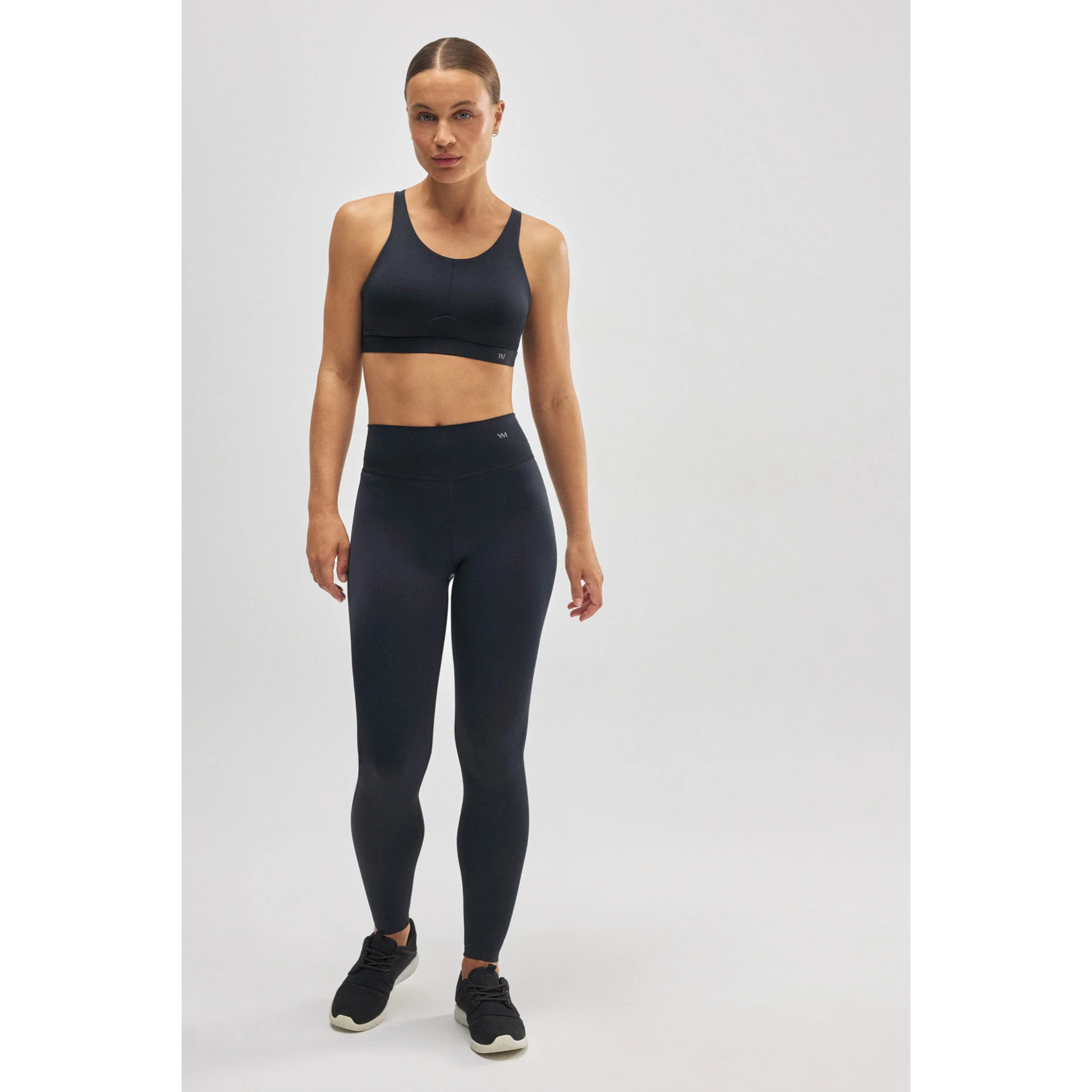 Leggings sportivi neri effetto pancia piatta