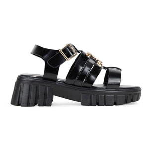 Sandalias negras con cadena y suela track