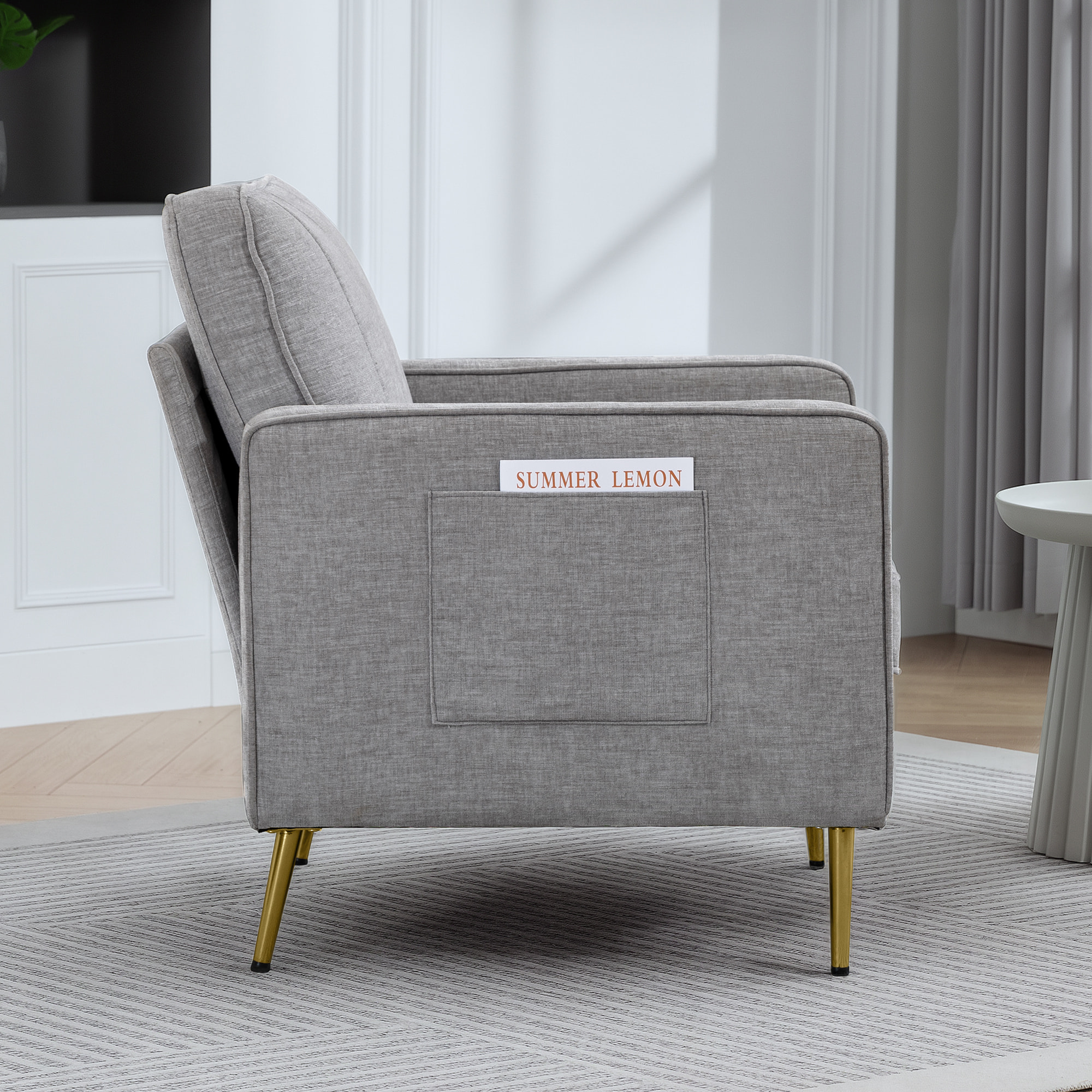 Fauteuil style art déco piètement métal doré tissu gris clair