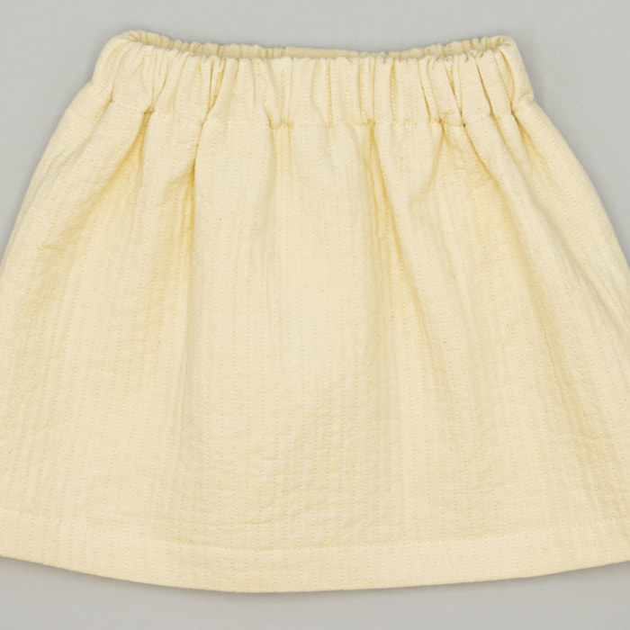 Falda Beige De Tejido Texturizado Con Bolsillos