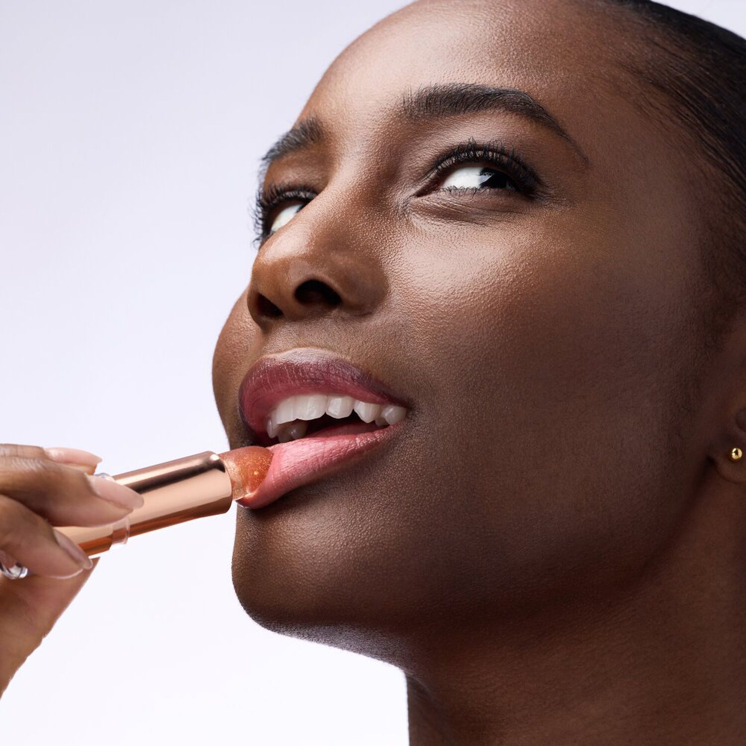 Glam In Gold Glow Lip Balm - Baume à Lèvres Transparent Formule Pailletée