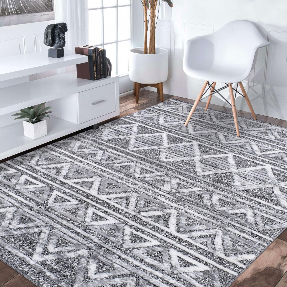 Tapis Gaco en relief dessin ethnique géométrique, couleur gris et blanc