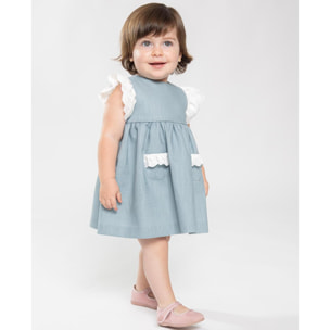 Vestido corto de lino verde, tira bordado en las sisas y los bolsillos.