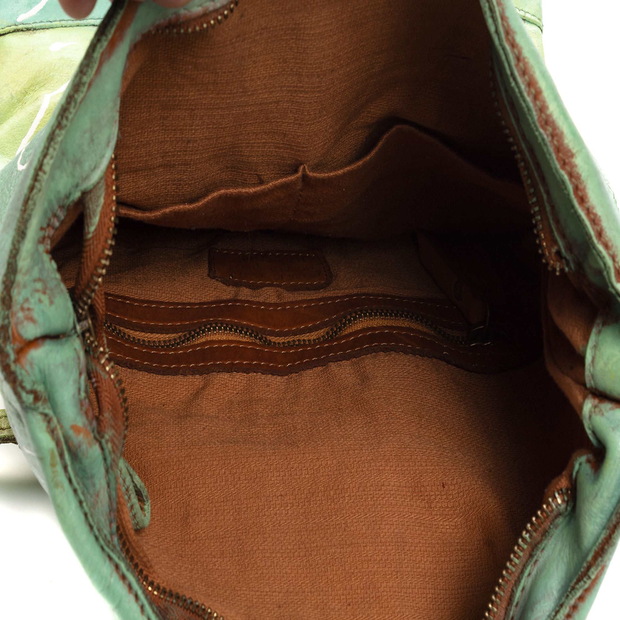 Antrona bolso mochila mujer. Piel auténtica acabado Sauvage pintado a mano.