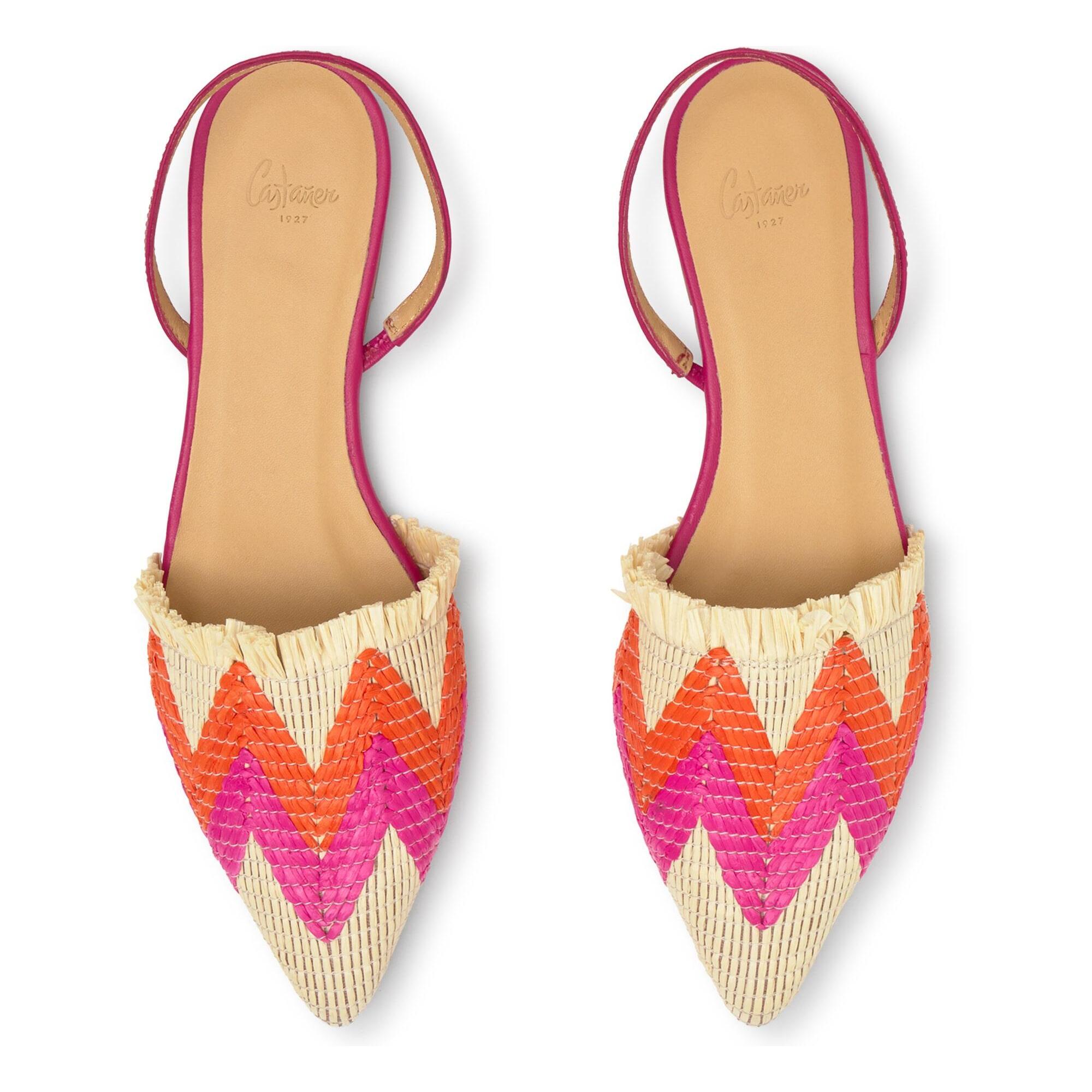 Zapato plano destalonado Berta en rafia trenzada con tira posterior en napa