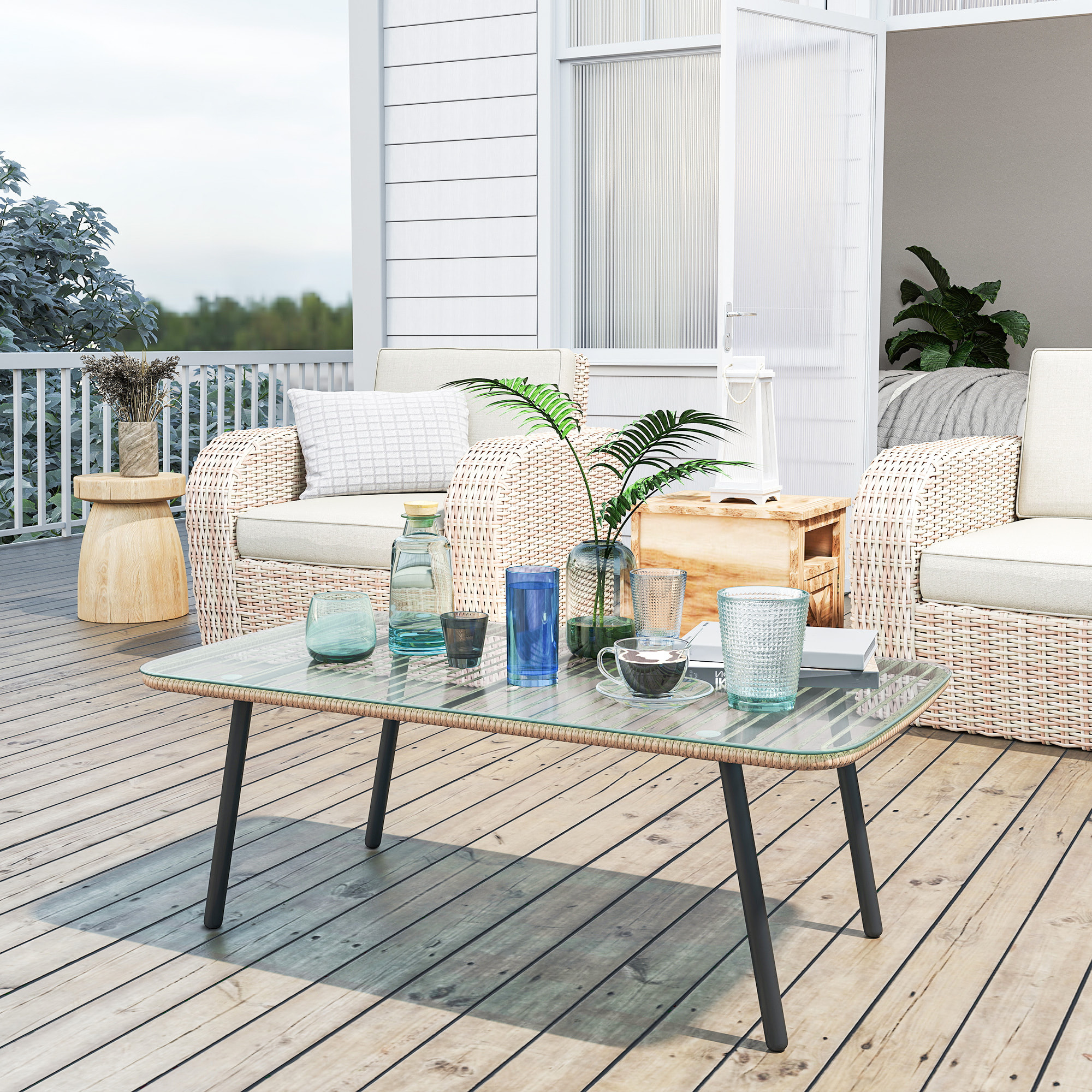 Table basse de jardin style Acapulco piètement incliné acier noir résine filée effet naturel plateau verre trempé
