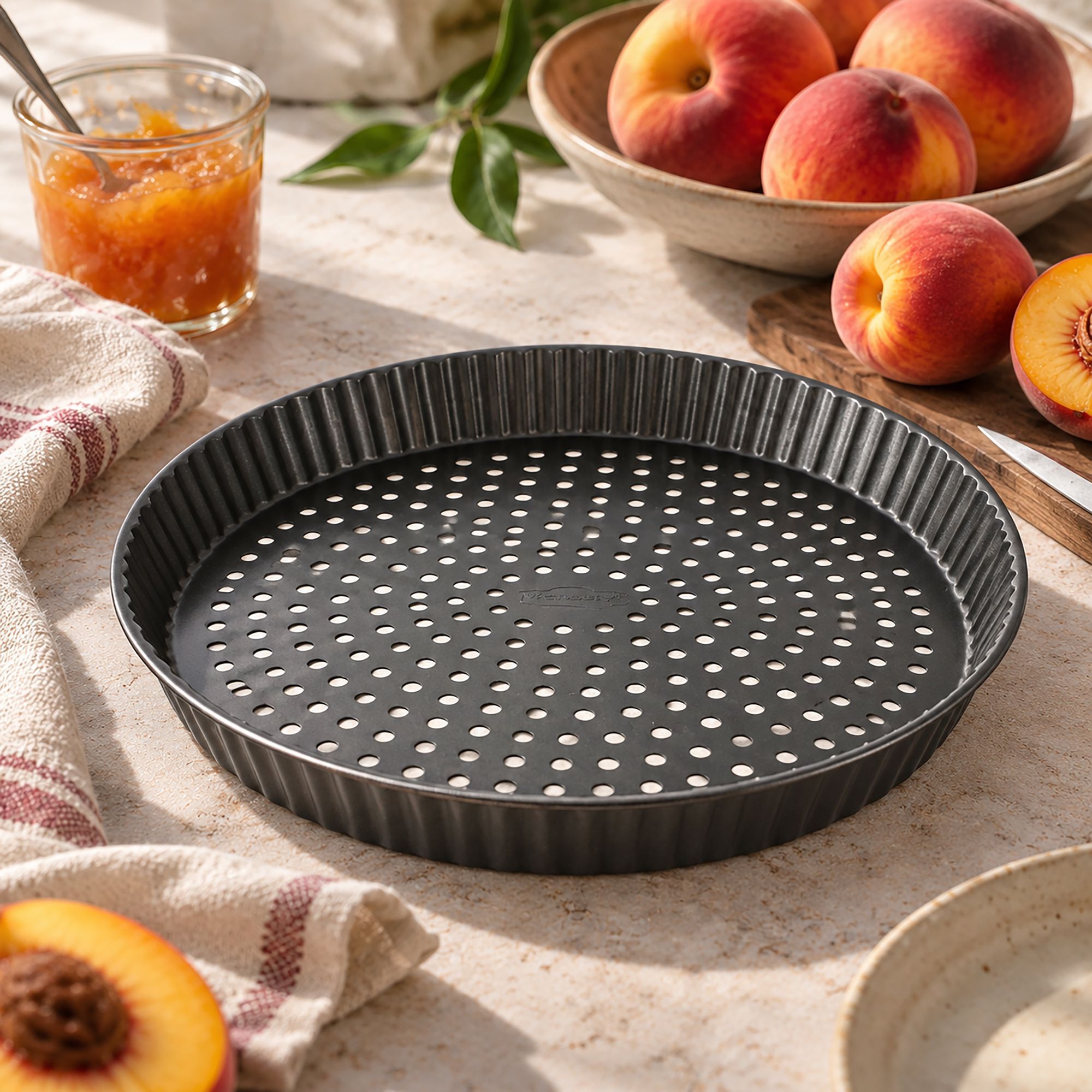 Moule à tarte perforé en acier carbone 30cm AMANDINE