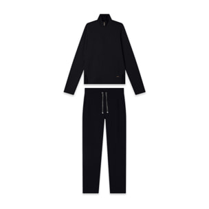 Tuta donna con zip, collo alto e dettagli animalier