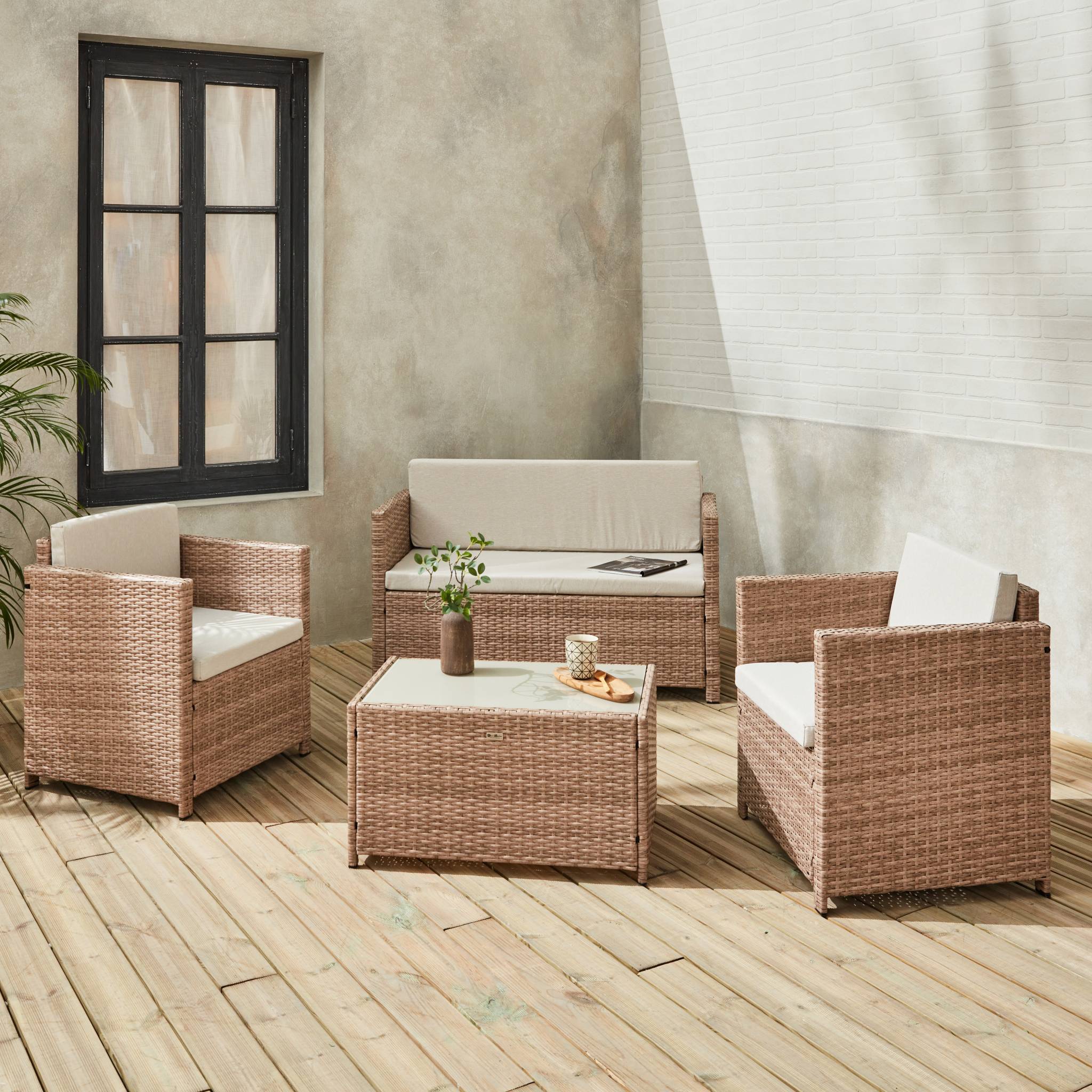 Salon de jardin en résine tressée - Perugia - Résine naturelle Coussins  beiges - 4 places - 1 canapé. 2 fauteuils. une table basse