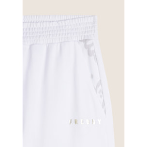 Pantaloni con elastico sul fondo e dettagli floreali