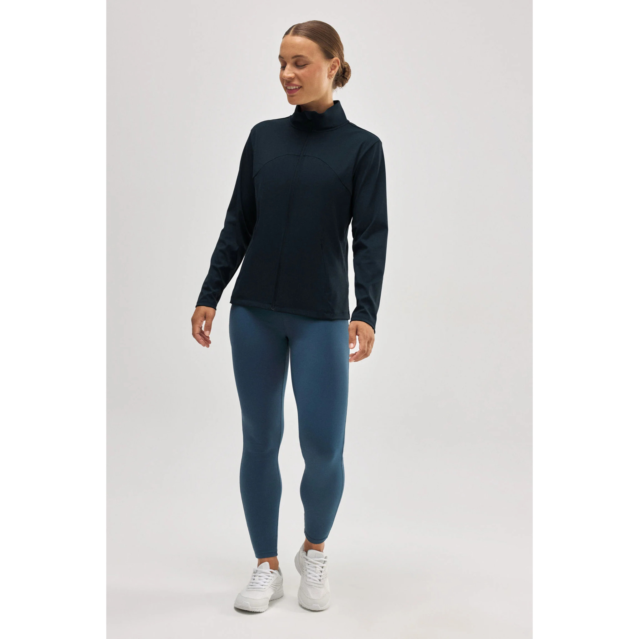 Giacca sportiva nera traspirante e aderente