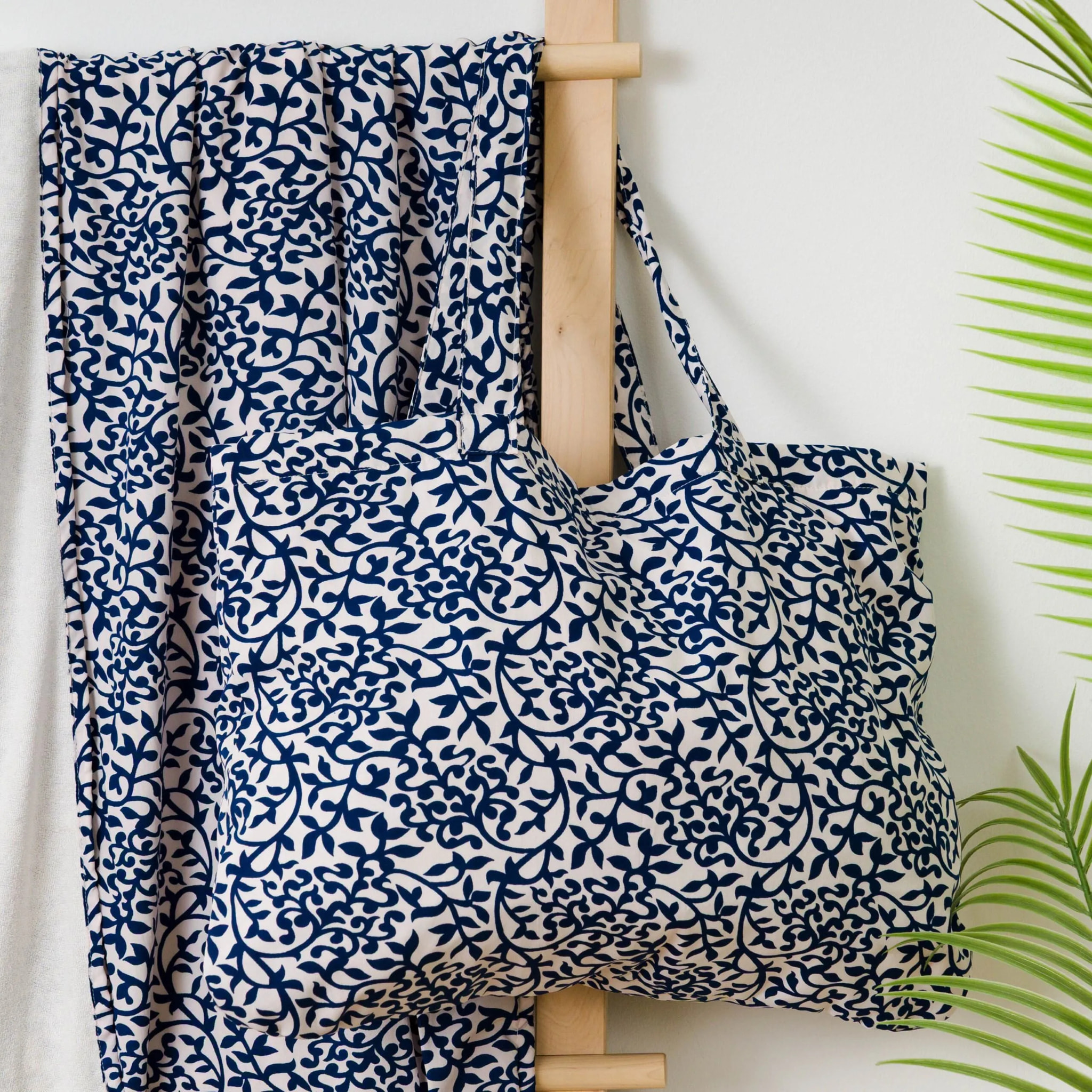 Confezione asciugamano sarong + borsa a mano