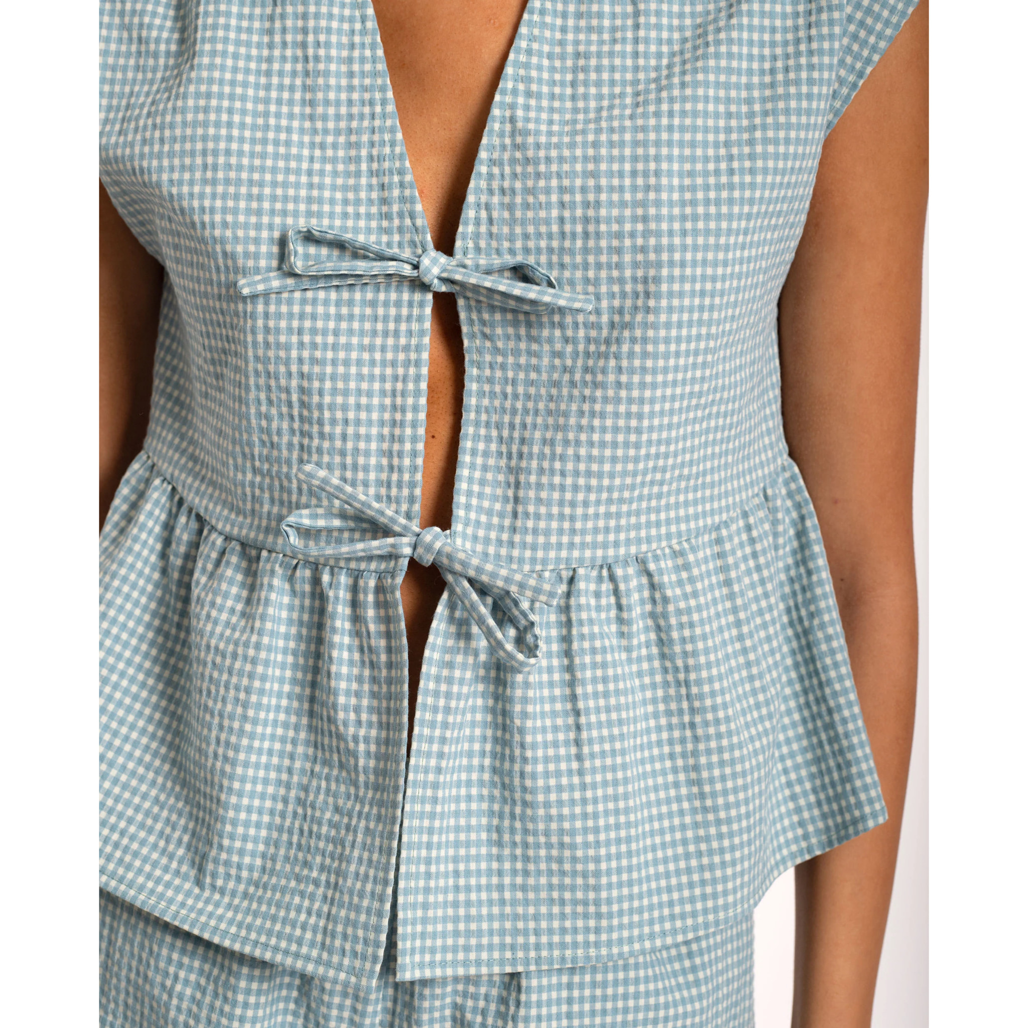 Blusa de mujer con lazos y estampado vichy