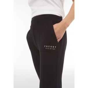 Pantaloni cropped in heavy jersey con tasche applicate