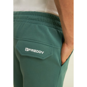 Pantaloni slim in interlock con stampa UT e cuciture