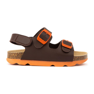 Sandalias infantiles en tono azul marino con detalles rojos y cierre adherente ajustable