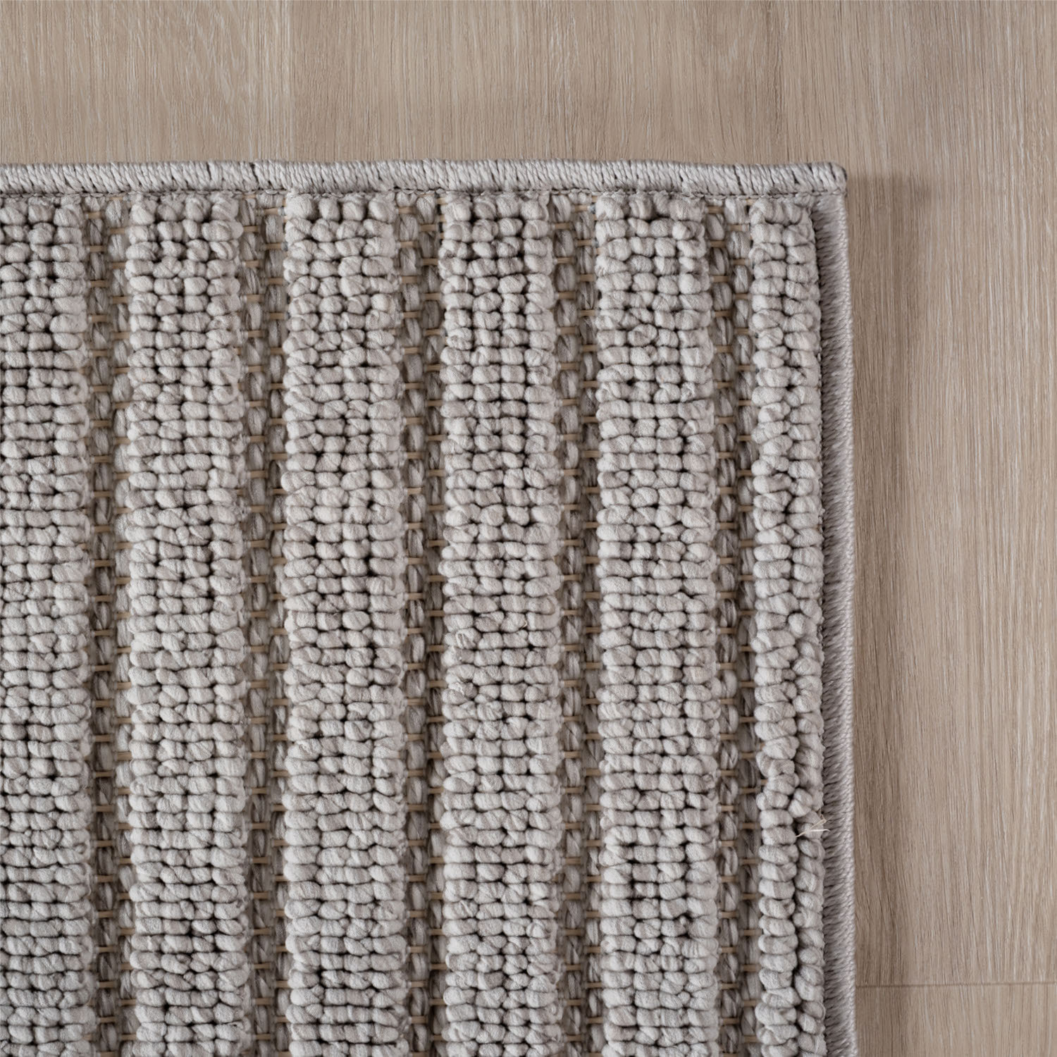 HELIX - Tapis moderne rond effet laine bouclé à motif géométrique en relief gris