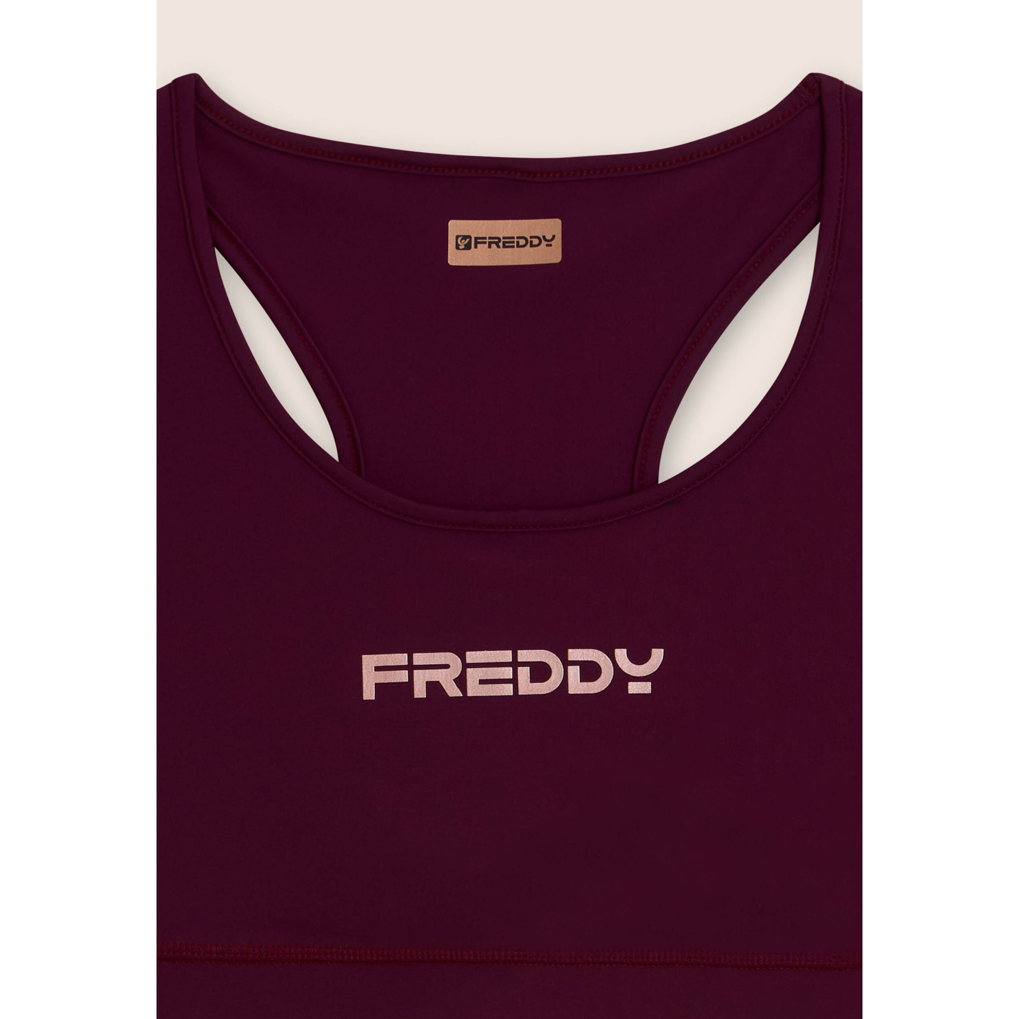 Top sportivo con retro vogatore elasticizzato