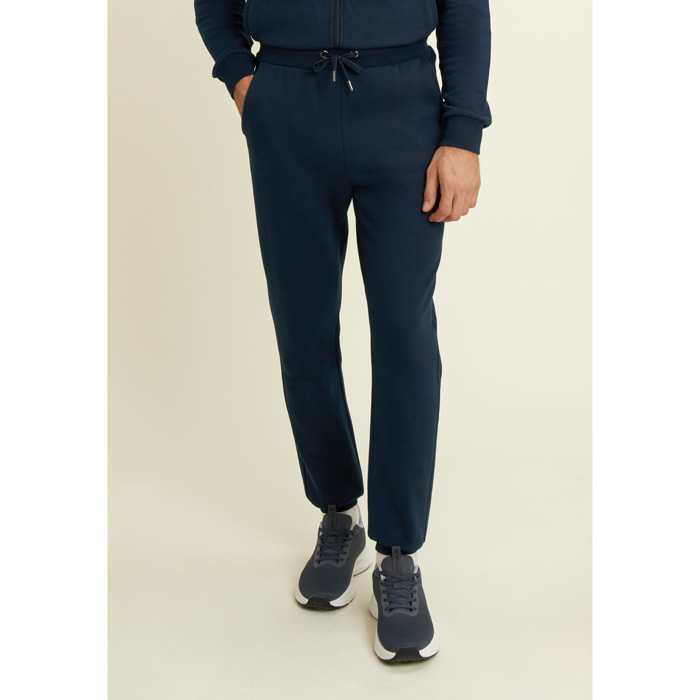 Pantaloni regular in felpa garzata con fondo in costina