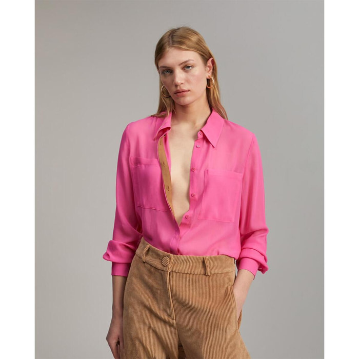 Camicia semitrasparente con tasche