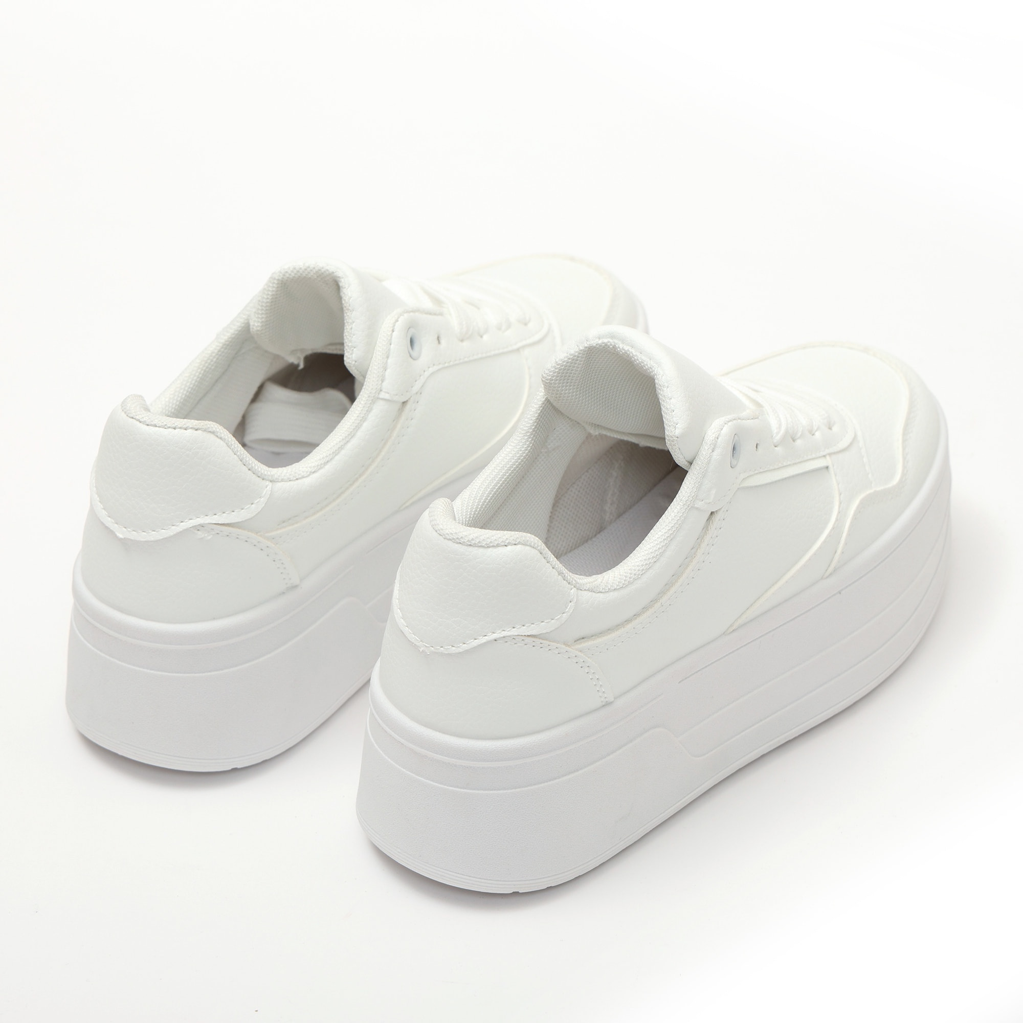 Sneakers in simil pelle platform