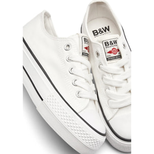Sneakers basse con plateau bianche