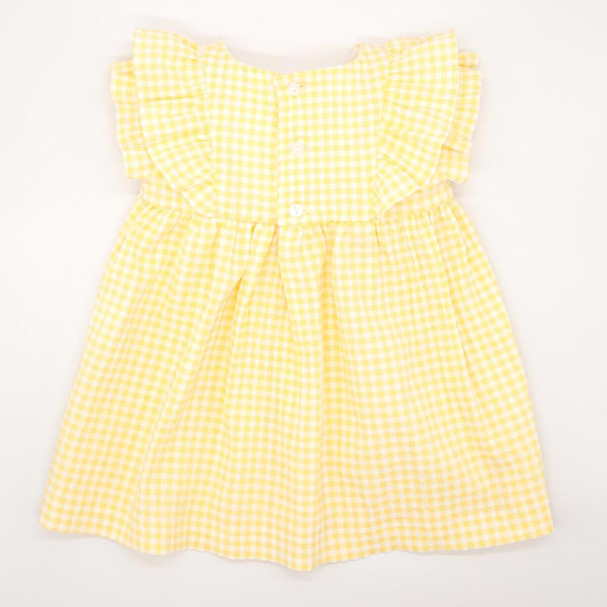 Vestido corto estampado de vichy amarillo, con volante y lazo.