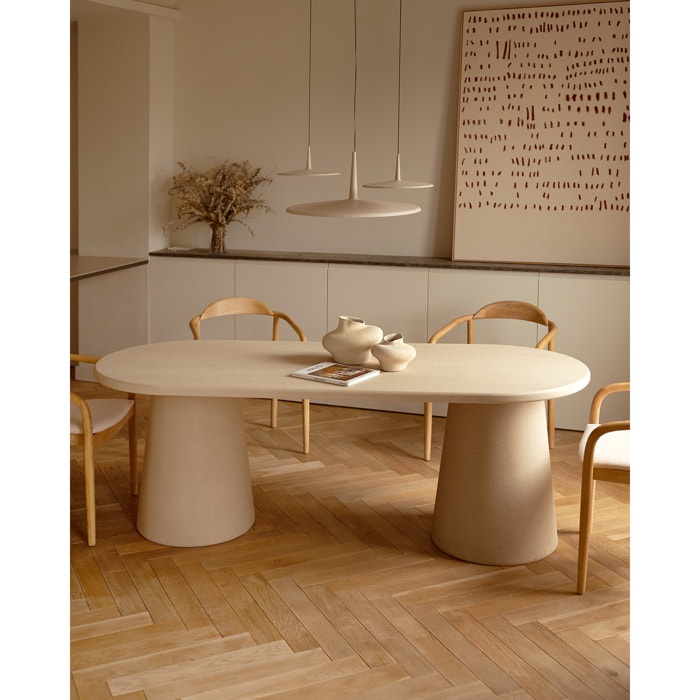 Table de salle à manger ovale en microciment ton beige en différentes tailles