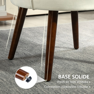 Fauteuil design coquillage piètement effilé bois d'hévéa dossier enveloppant strié aspect velours crème