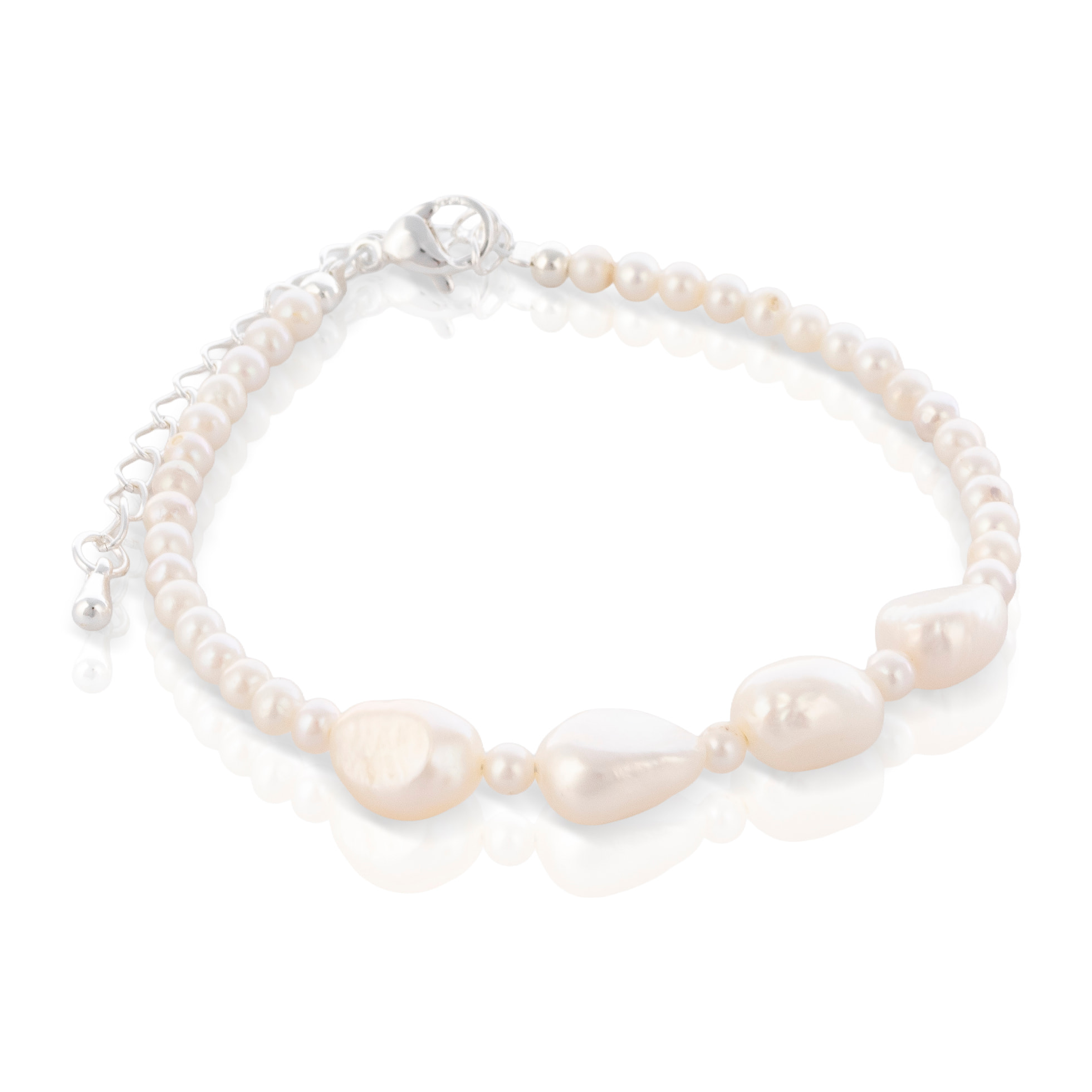 Abundantia Pulsera de perlas naturales de distintos tamaños, con cierre de mosquetón.