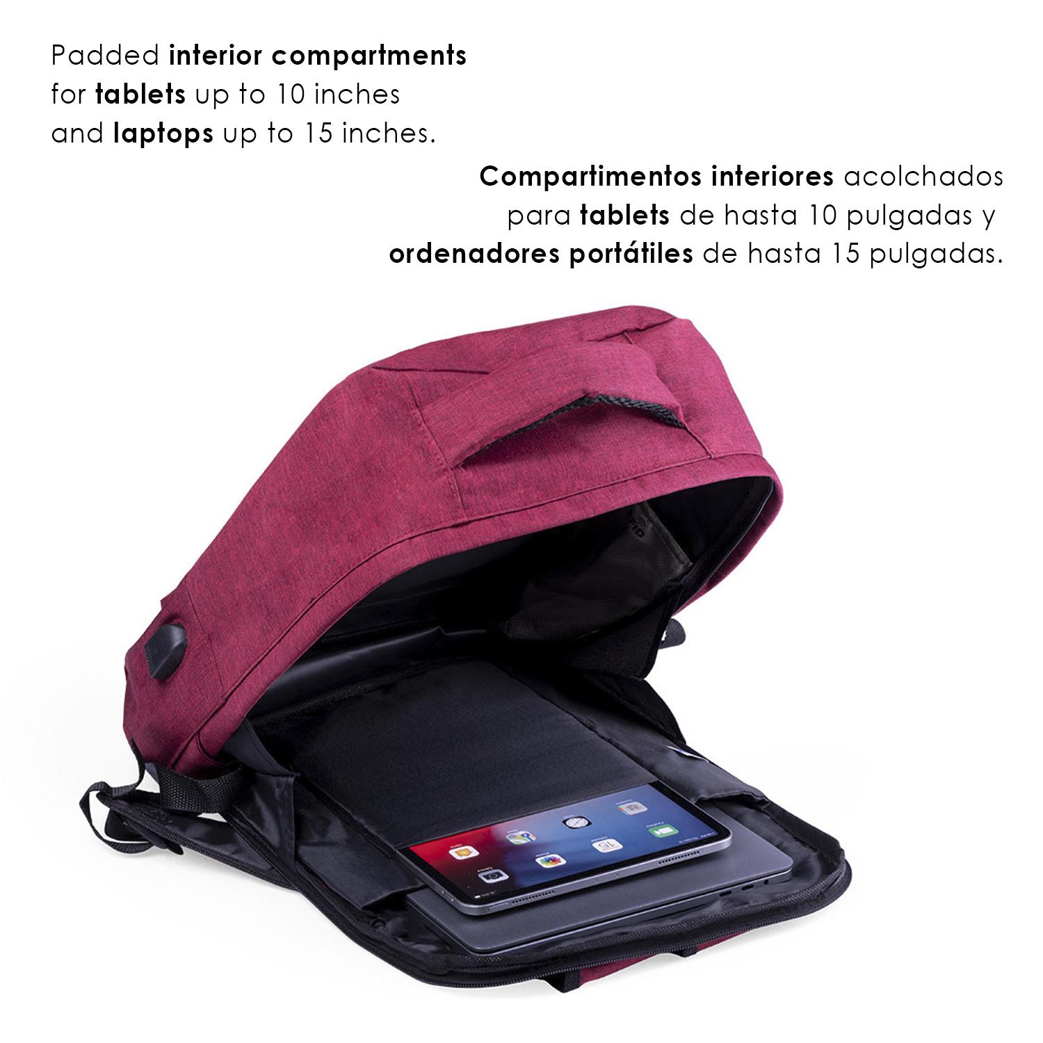 Mochila antirrobo Komplete de poliester 300D, con toma USB exterior. Bolsillo en lateral con protección RFID.