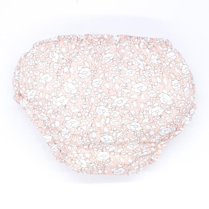 Cubrepañal estampado de flor rosa. Elastico en la cintura y en las piernas.