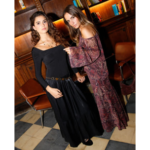 Vestido largo con cuerpo de punto y falda boho satinada con volante.