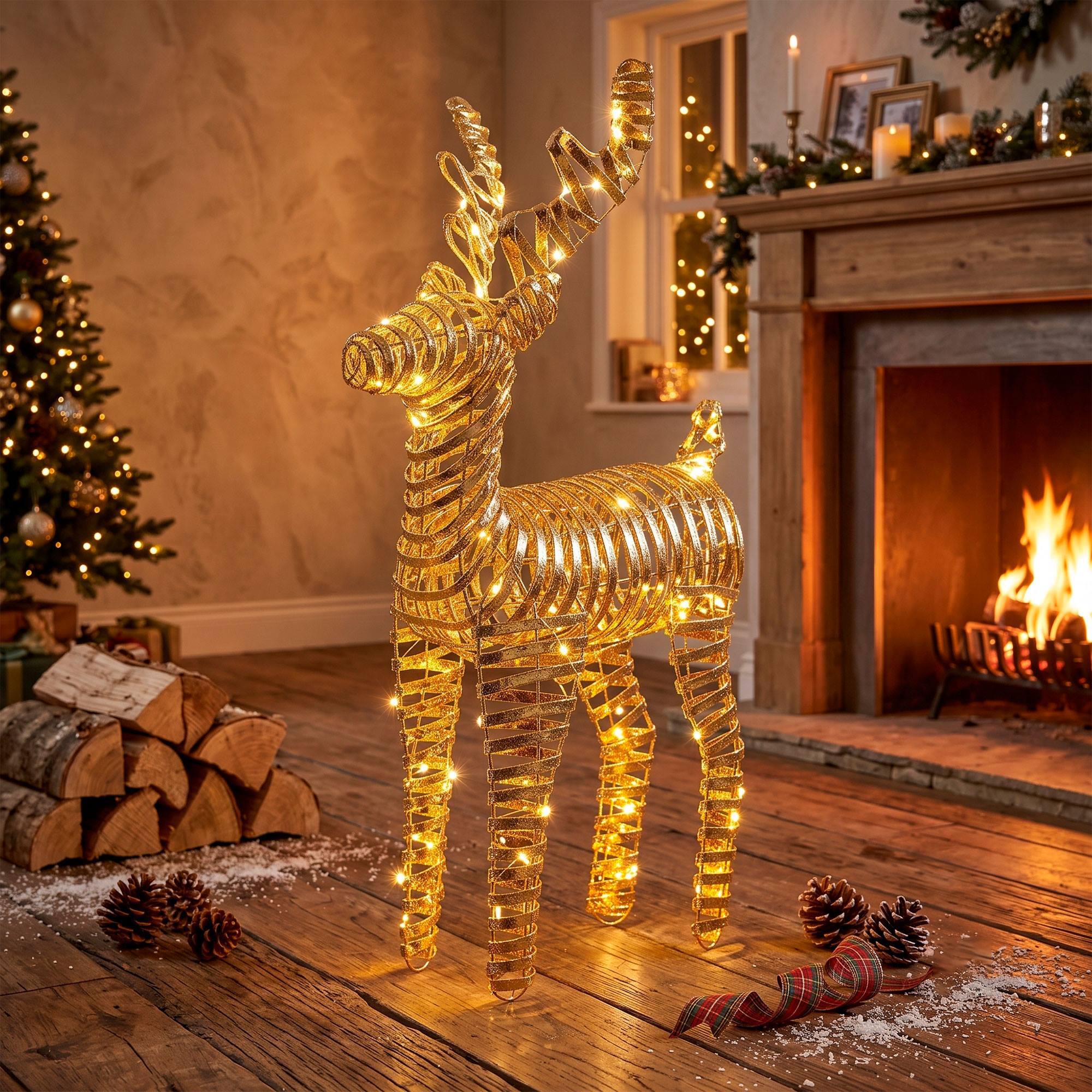 Reno navideño led dorado con 60 microled blanco cálido, con temporizador 36x14x60 cm