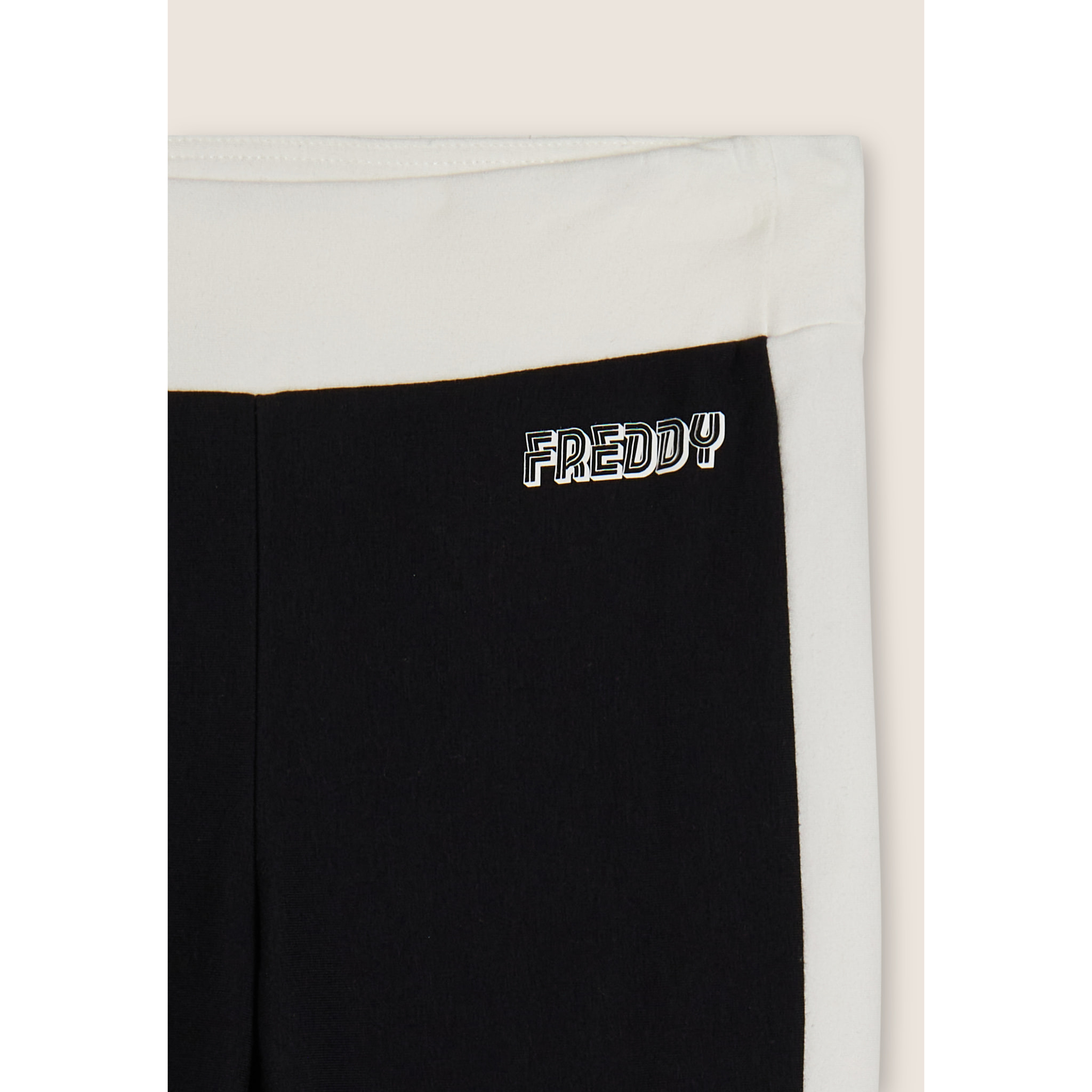 Pantaloni slim flare in felpa con bande laterali