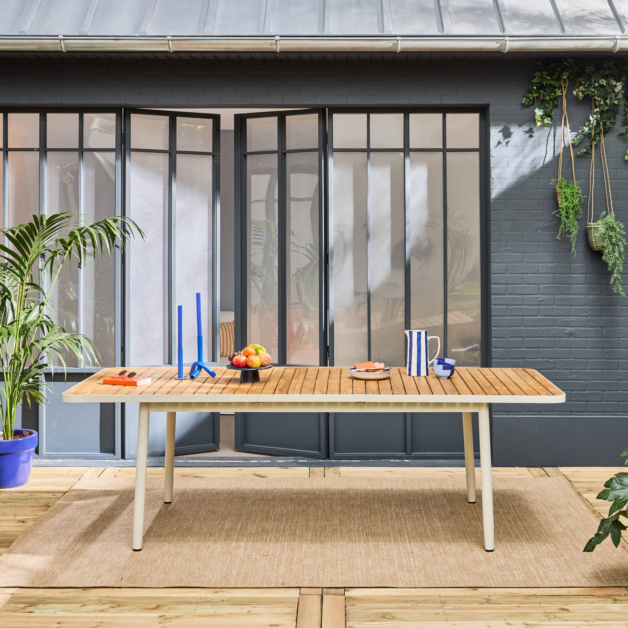 Table de jardin extensible en bois teck. structure aluminium blanc 8 places