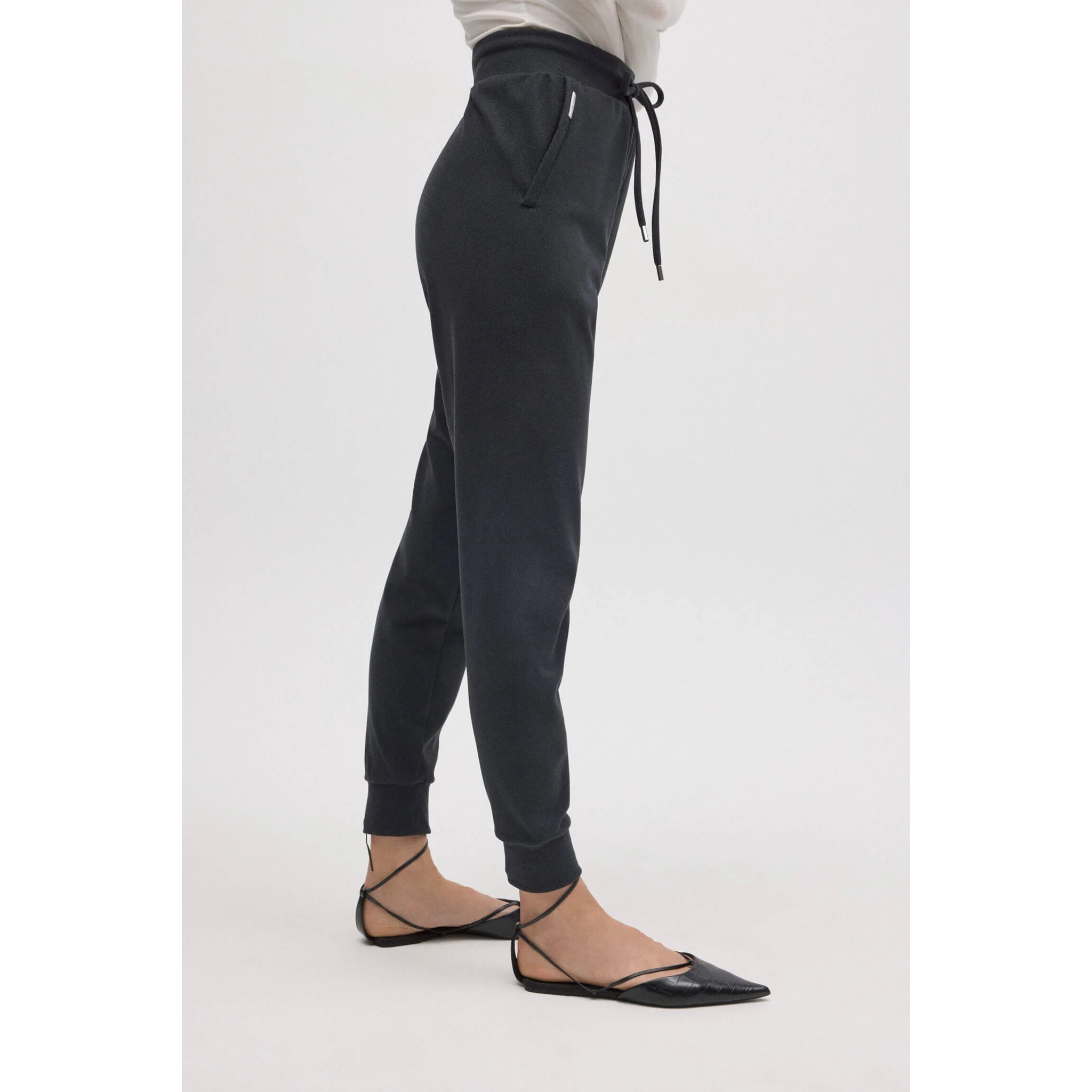 Pantaloni jogger color carbone testurizzati