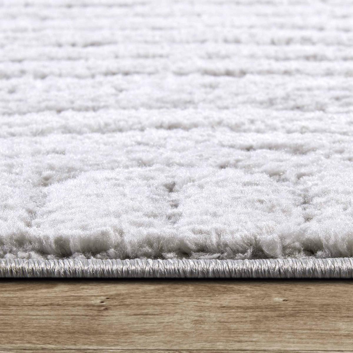 Tapis salon, motif géométrique, texture relief, lym chaleureux