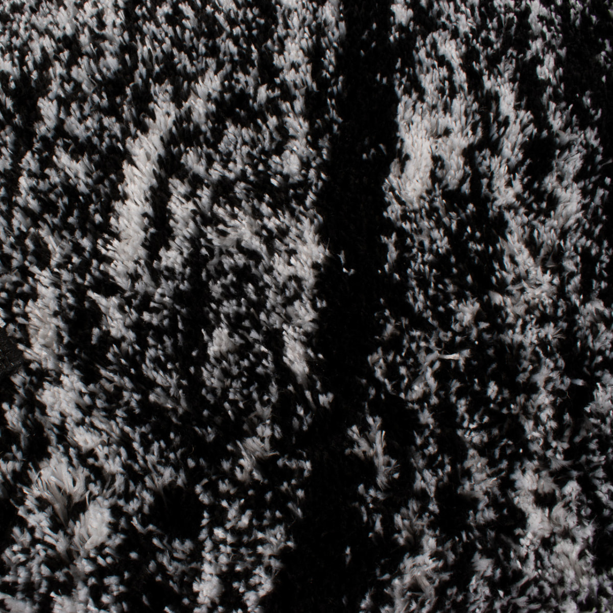 Oslo - tapis moderne abstrait à poils longs noir