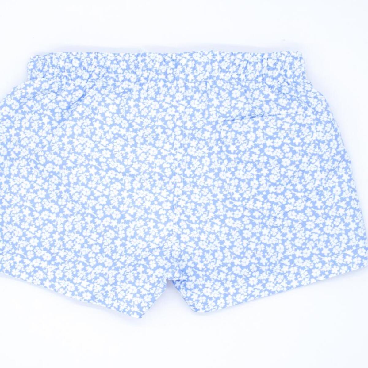 Bóxer de flores azul celeste.