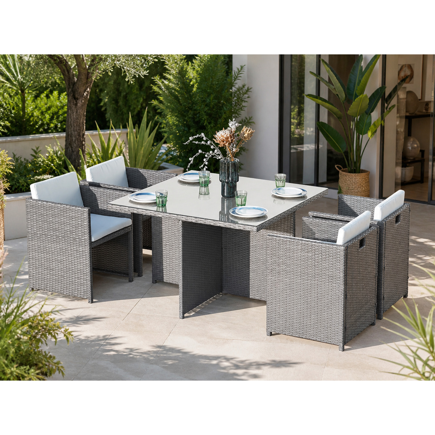 Table et chaises 4 places encastrables en résine gris-blanc REGINA