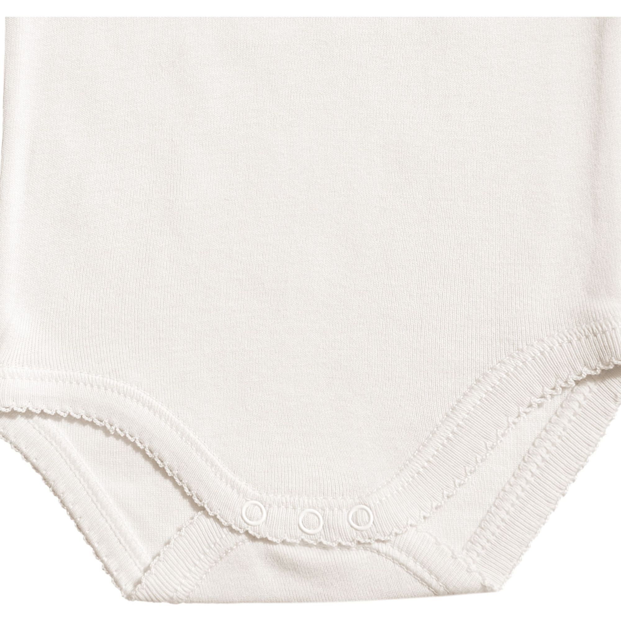 Body bebé tirantes finos volantes niña