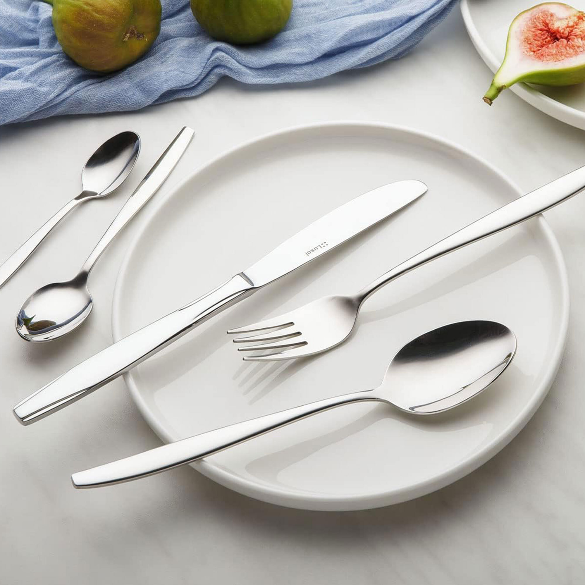 juego de 24 cubiertos de acero inoxidable con revestimiento plata