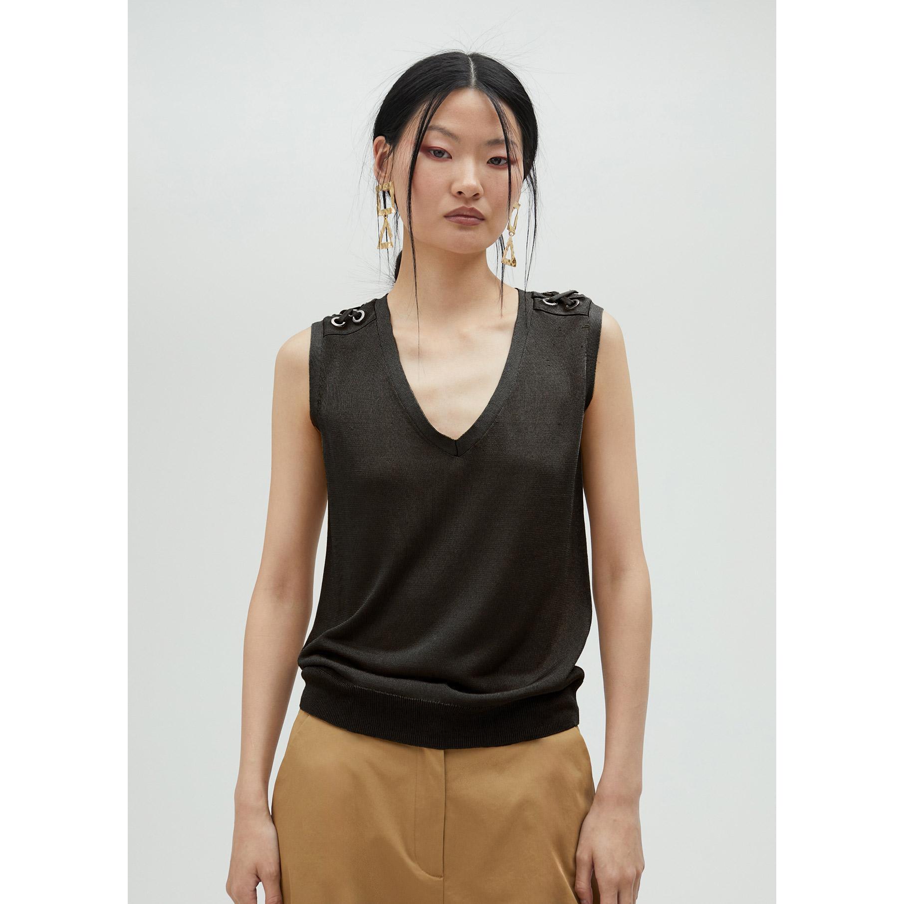 Top in maglia con occhielli