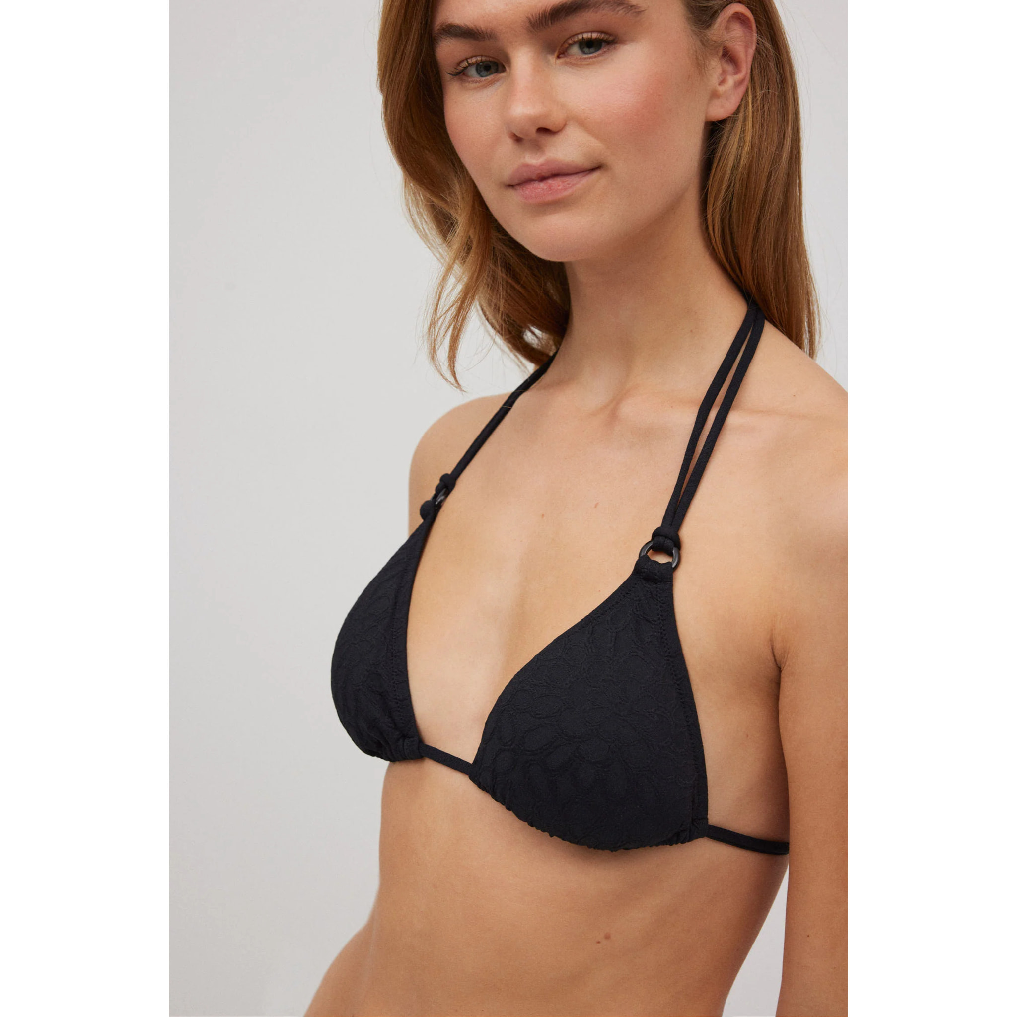 Set bikini a triangolo con trama bianca