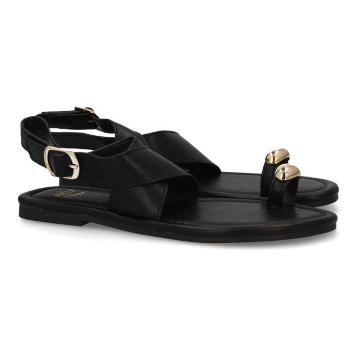 Sandalias planas elegantes mujer con adorno metálico.